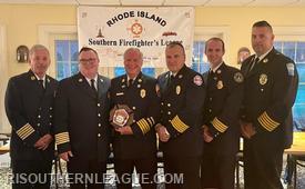 League Director Chief John Mackay, President Chief Justin Lee, Chief Quinn, League VP Chief Tom Reed, League Secretary AC Chris Koretski, and League Treasurer Chief Andrew Kettle pose following the award portion of the evening. 